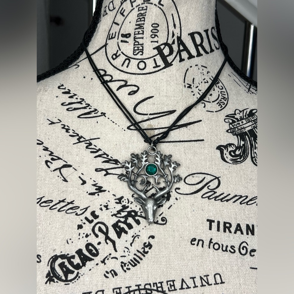 Deer necklace with green jewel